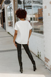 White Boston College Eagles To The Point Flowy Tee - Back View, Curved Hem Detail with Black Leggings | Gameday Couture - SOHO