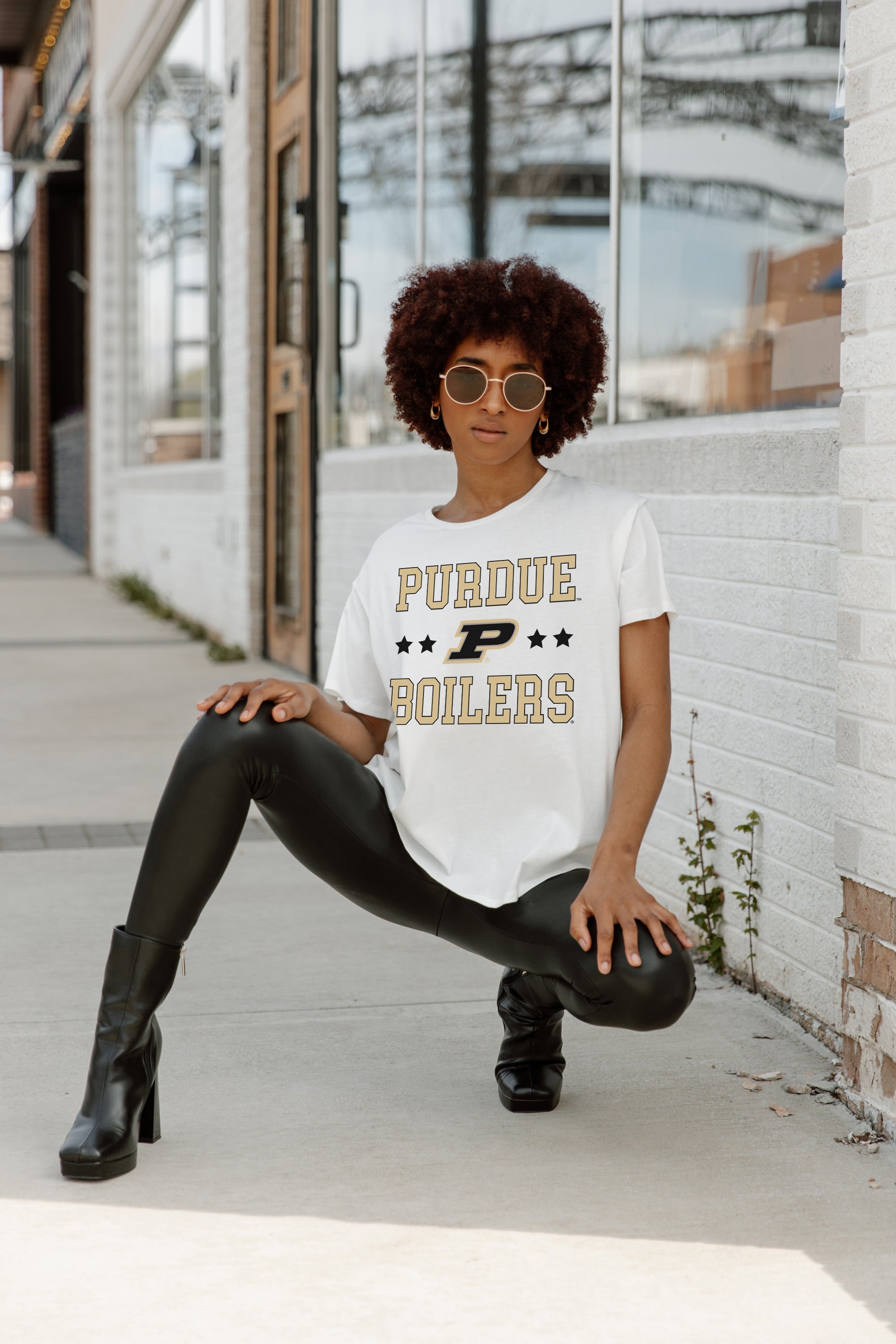 White Purdue Boilermakers To The Point Flowy Tee - On Model Seated Street Style Look | Gameday Couture - SOHO