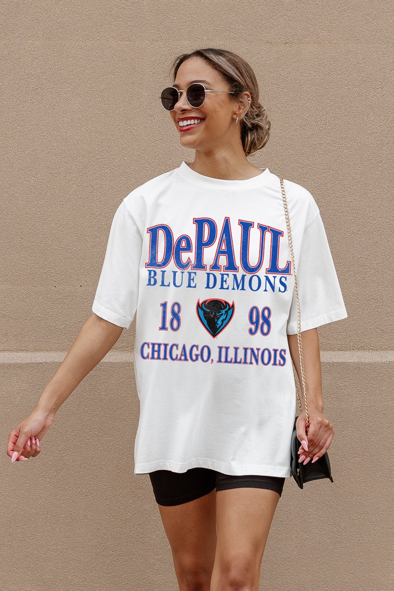 Ivory DePaul Blue Demons Unity Oversized Tee - Street Style Crouch Pose with Belt Bag | Gameday Couture - SOHO