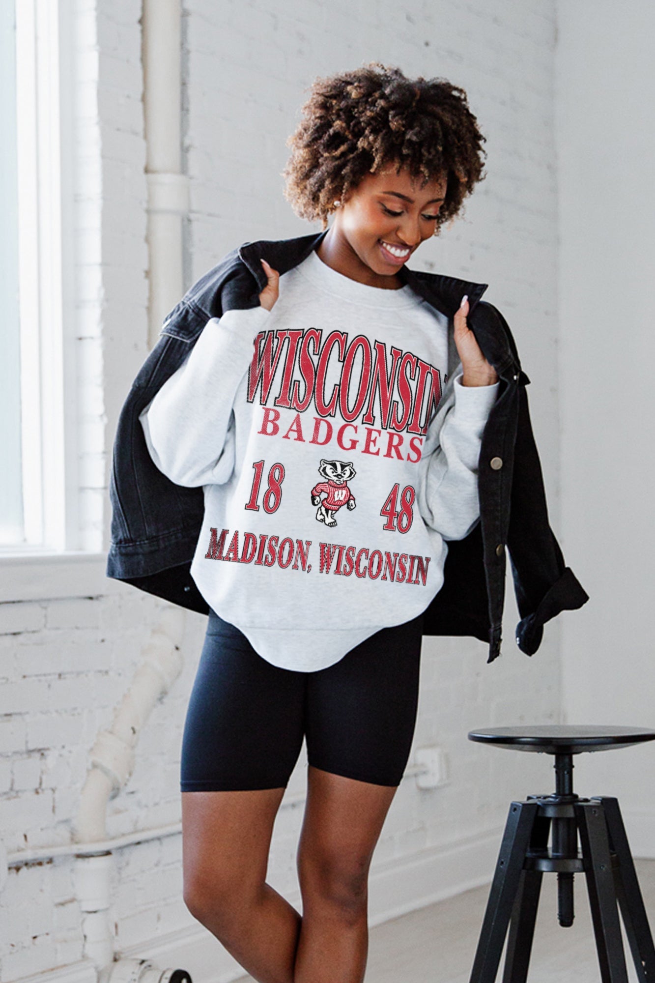Ash Grey Wisconsin Badgers Allegiance Premium Fleece Pullover - Layered Under Denim Jacket Lifestyle Shot | Gameday Couture - SOHO