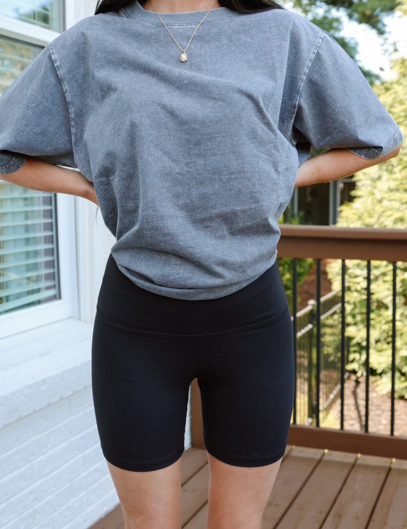 Black CHIC BREEZE BIKER SHORTS - On Model Front View, Styled with Oversized Tee | Gameday Couture - SOHO