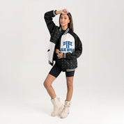 Black & White Duke Blue Devils Varsity Bomber Jacket - On Model Front 3/4 View | Gameday Couture - SOHO