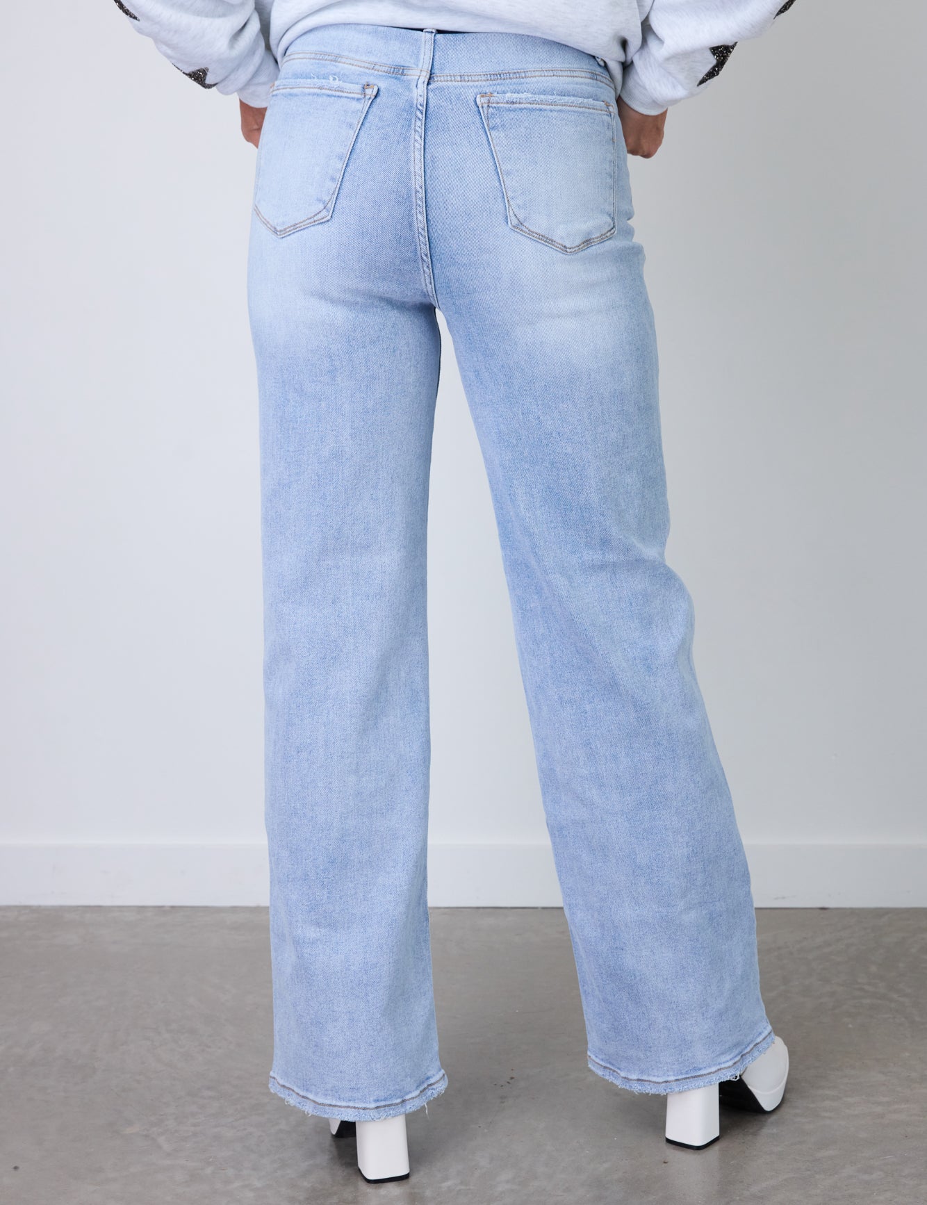 Light Blue DENIM DREAMLAND JEANS - Back View On Model | Gameday Couture - SOHO