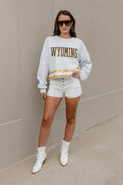 WYOMING COWBOYS PASS THE SHINE LONG SLEEVE METALLIC SHIMMER-STRIPE TOP WITH RIBBED NECKLINE AND CUFFS