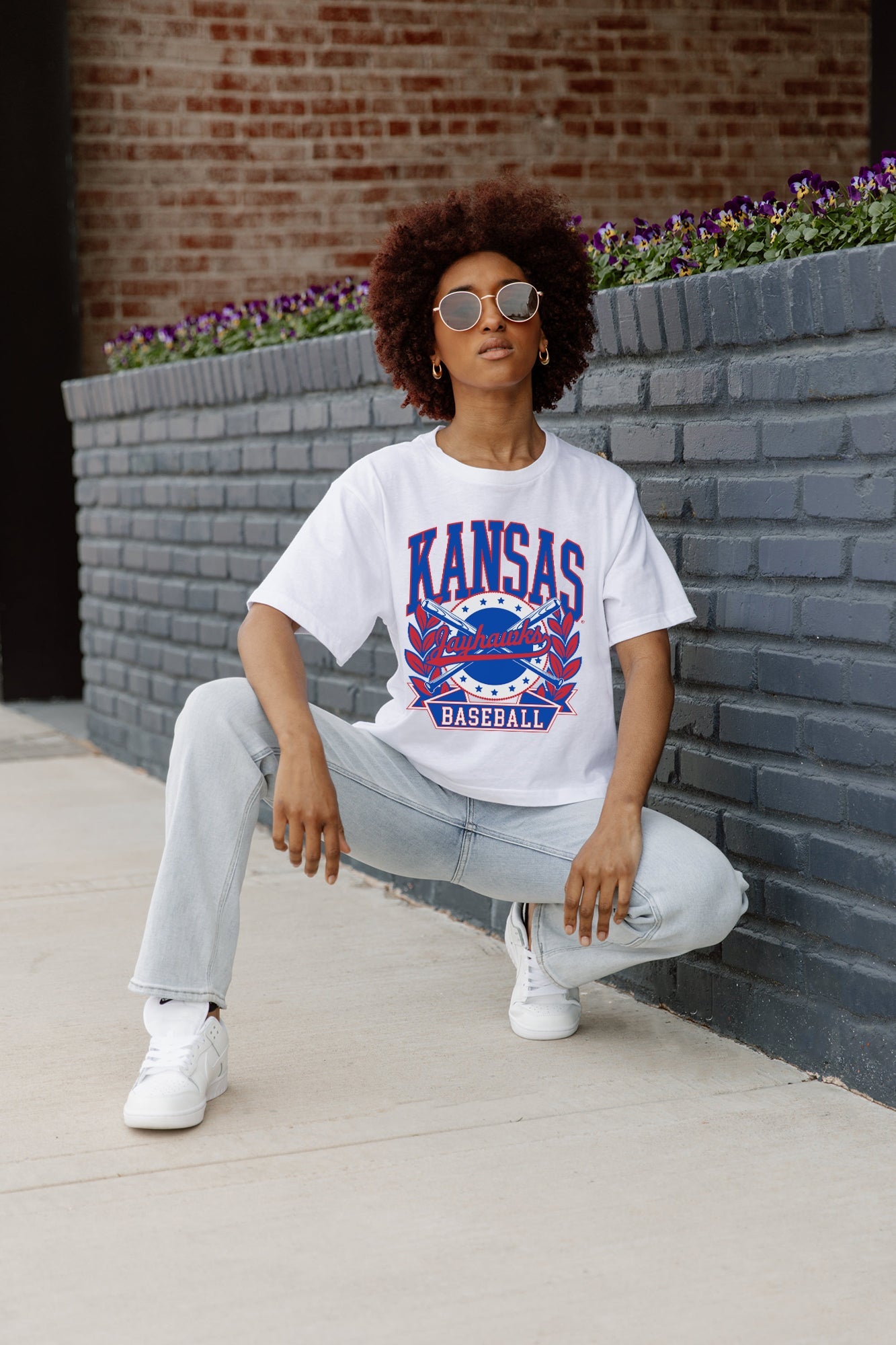 White Kansas Jayhawks Bases Loaded Boxy Crop Tee - Styled Crouch Pose On Model | Gameday Couture - SOHO
