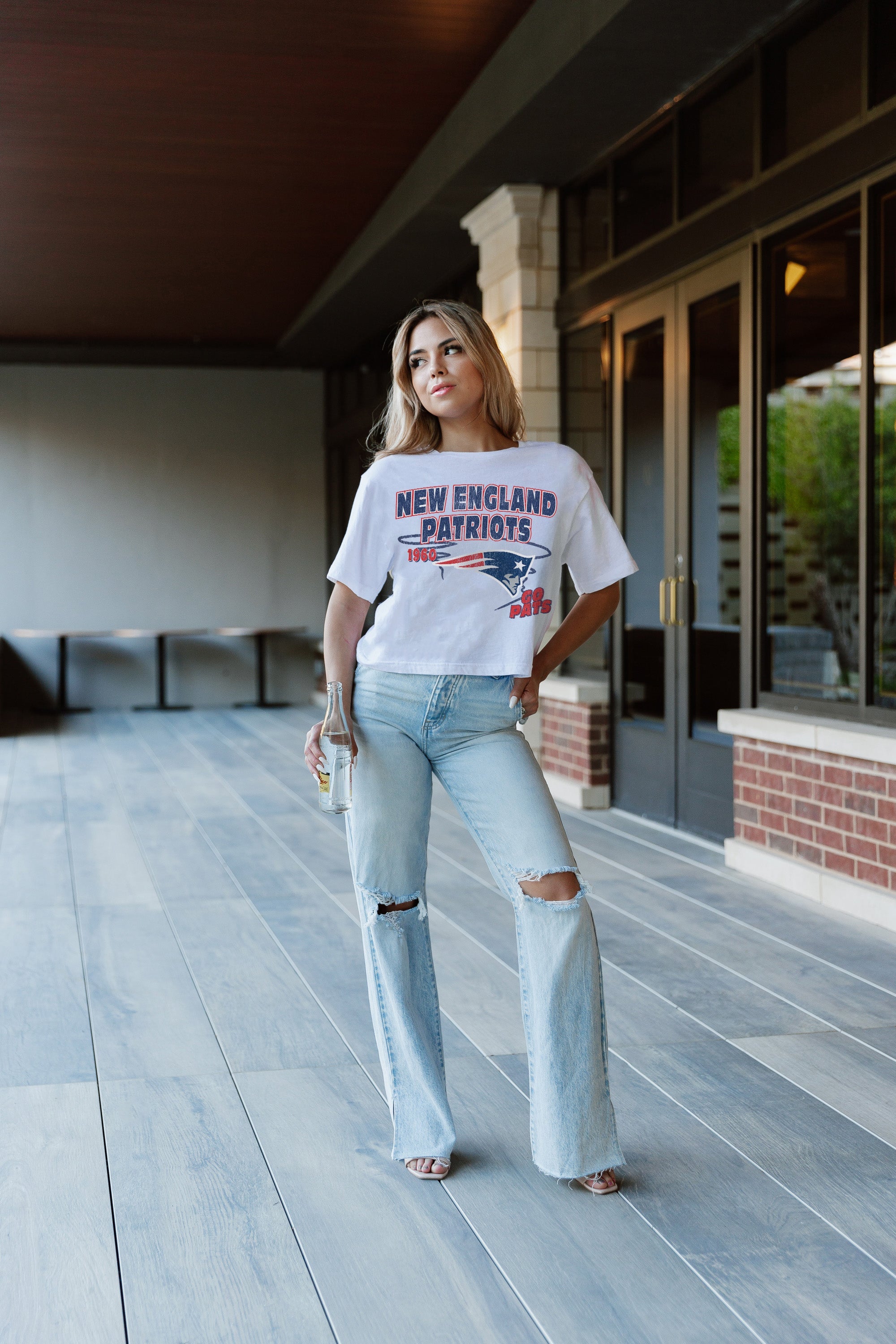 White NEW ENGLAND PATRIOTS GAMEDAY GOALS BOXY FIT WOMEN'S CROP TEE - Casual Stance View | Gameday Couture - SOHO