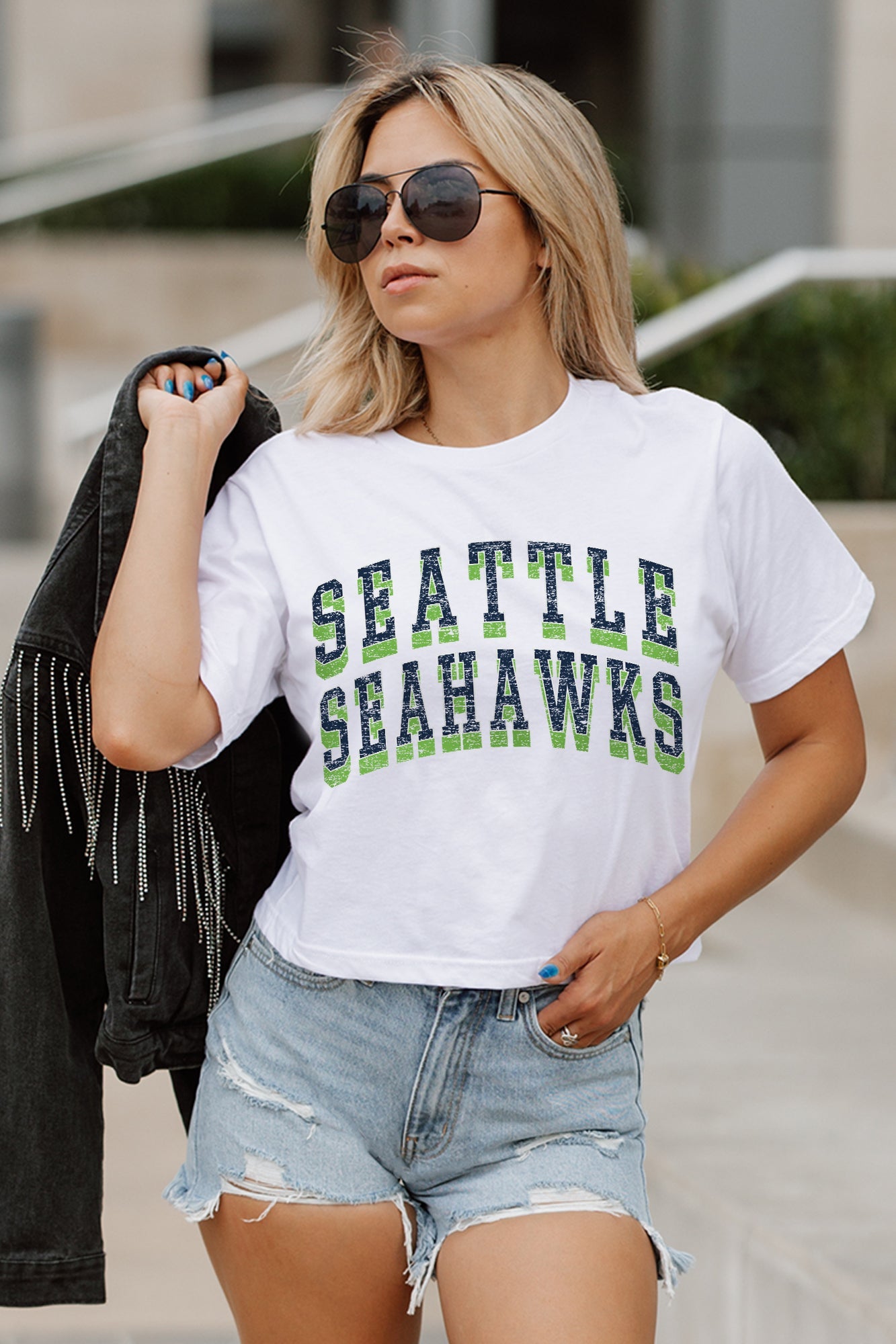 White Seattle Seahawks CLAIM TO FAME Boxy-Fit Crop Tee - Front Graphic Detail On Model | Gameday Couture - SOHO