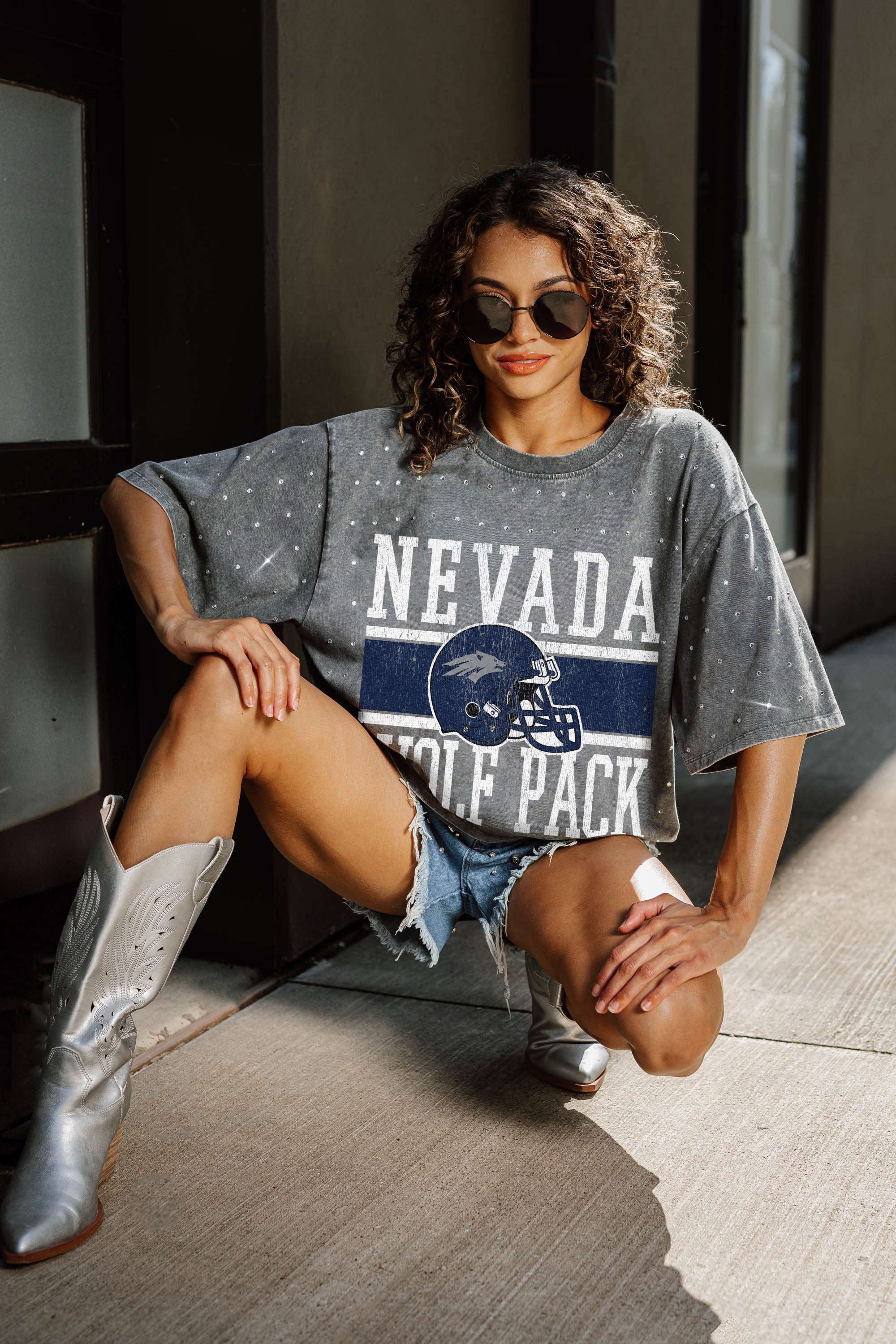 Grey Nevada Wolf Pack Mini Rhinestone Tee - Seated Lifestyle Shot, Rhinestone Detail Sparkling | Gameday Couture - SOHO