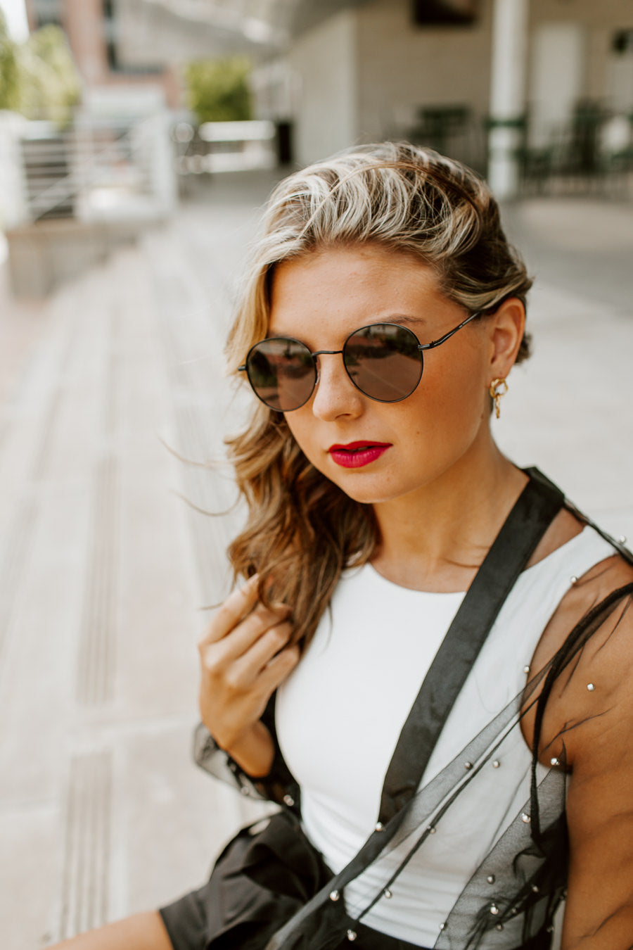Black Metal PAULINA ROUND FRAME Sunglasses - Lifestyle Look | Gameday Couture - SOHO